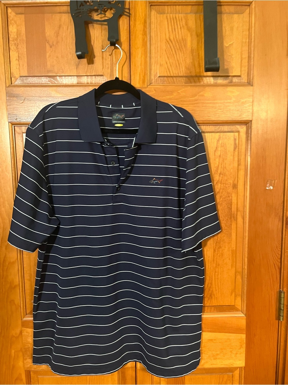 Greg Norman Collection Navy Polo with White Stripes
